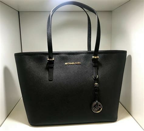 sac a main noir femme michael kors|Michael Kors canada.